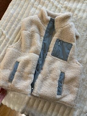 Cream Sherpa Vest with light blue Trim
